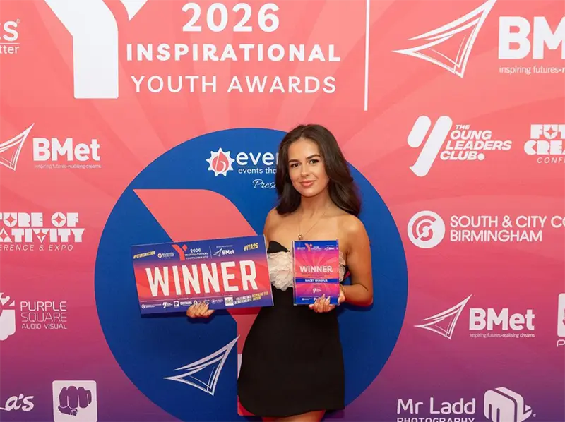 Macey Winspur pictured holding award