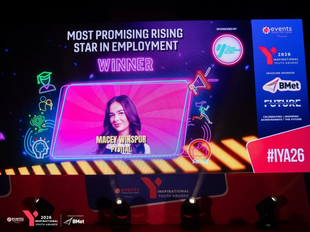 Macey Winspur announced on stage screen as winner